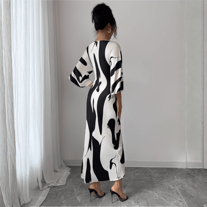 Charlie | Refined Abstract Print Twist Waist Midi Summer Dresses